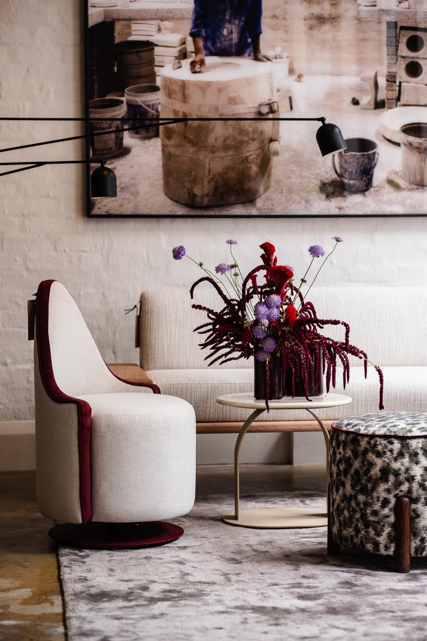 Lighting and furniture arrangement in neutral palette