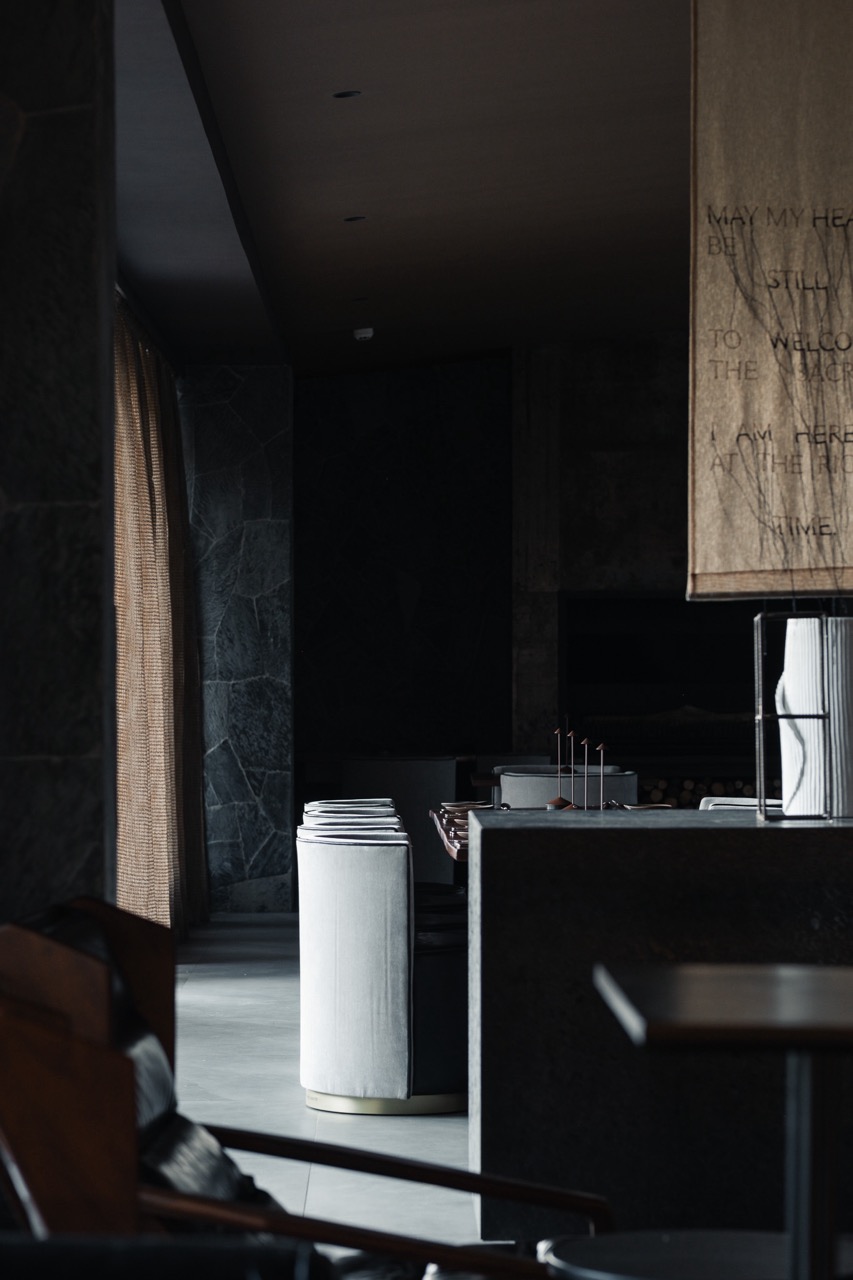 Sophisticated commercial space featuring designer furniture and architectural details