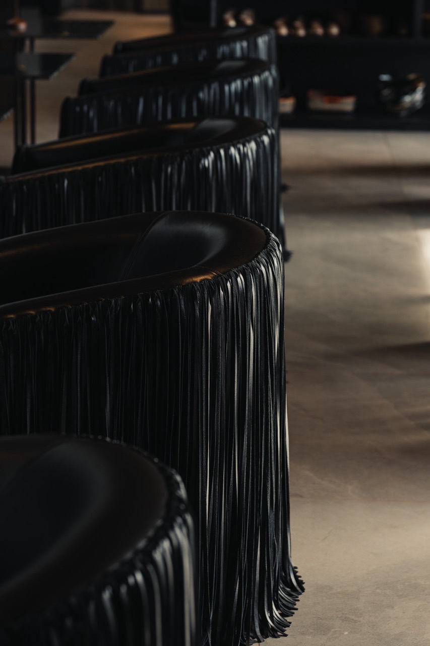 Premium office design showcasing custom architectural elements and designer lighting